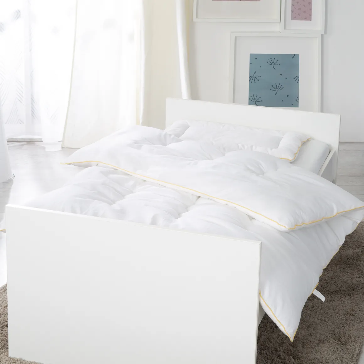 Imbottitura piumino con cuscino bianco – roba