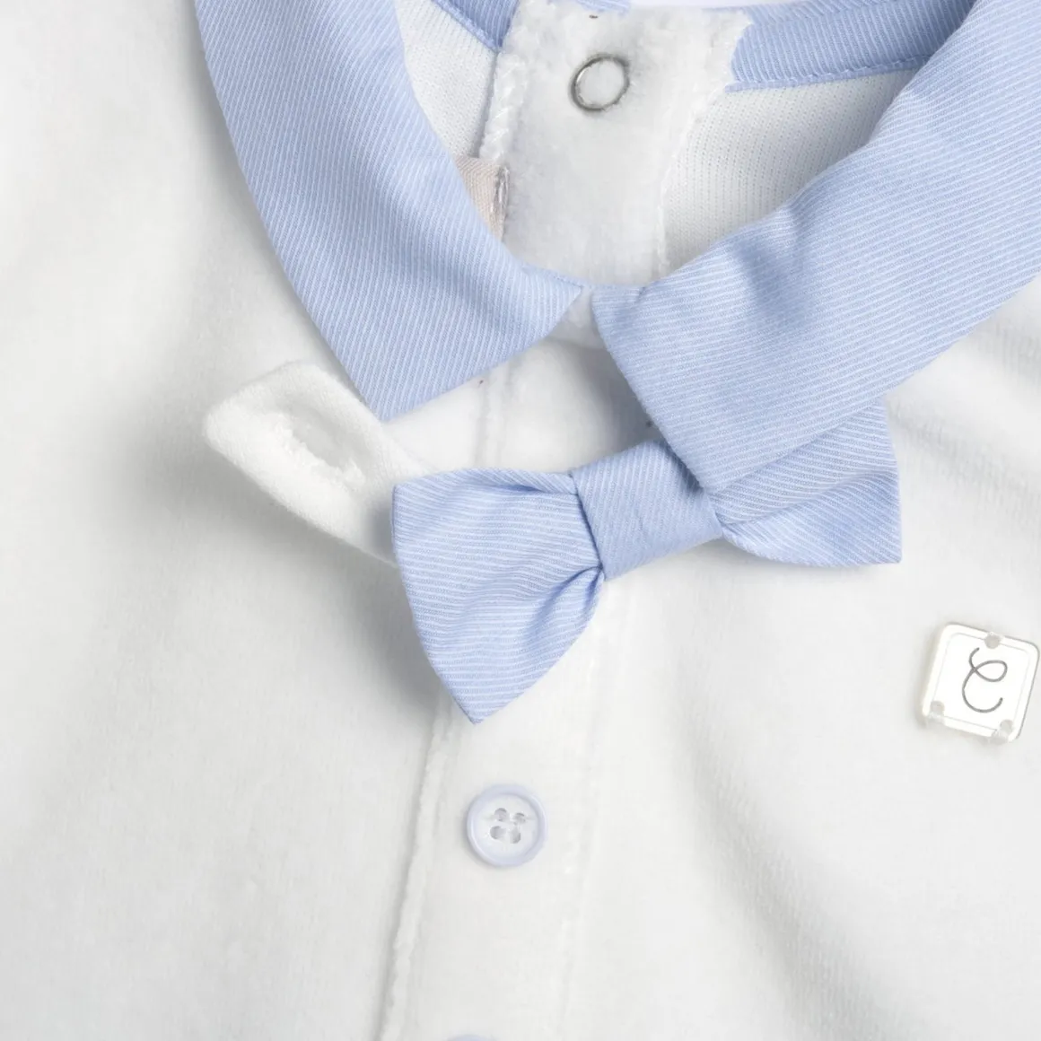 Tutina aperta entrogamba con papillon – chicco