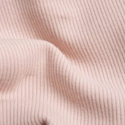 Tutina in caldo tessuto, con apertura sulla schiena e entrogamba ideale per primavera e autunno