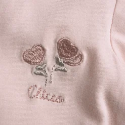 Tutina in cotone, ideale per primavera e autunno, con apertura frontale ed entrogamba