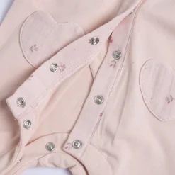 Tutina in cotone, ideale per primavera e autunno, con apertura frontale ed entrogamba