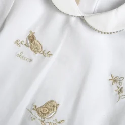 Tutina in tessuto leggero, con apertura sulla schiena ideale per primavera e autunno